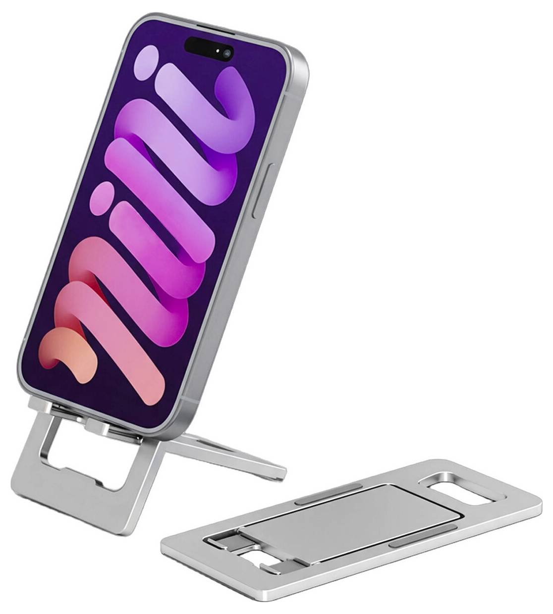 Stříbrný skládací stojánek na telefon držící smartphone ve svislé poloze, přičemž je stojánek zobrazen jak v sestavené formě, tak v rozloženém stavu na bílém pozadí.
