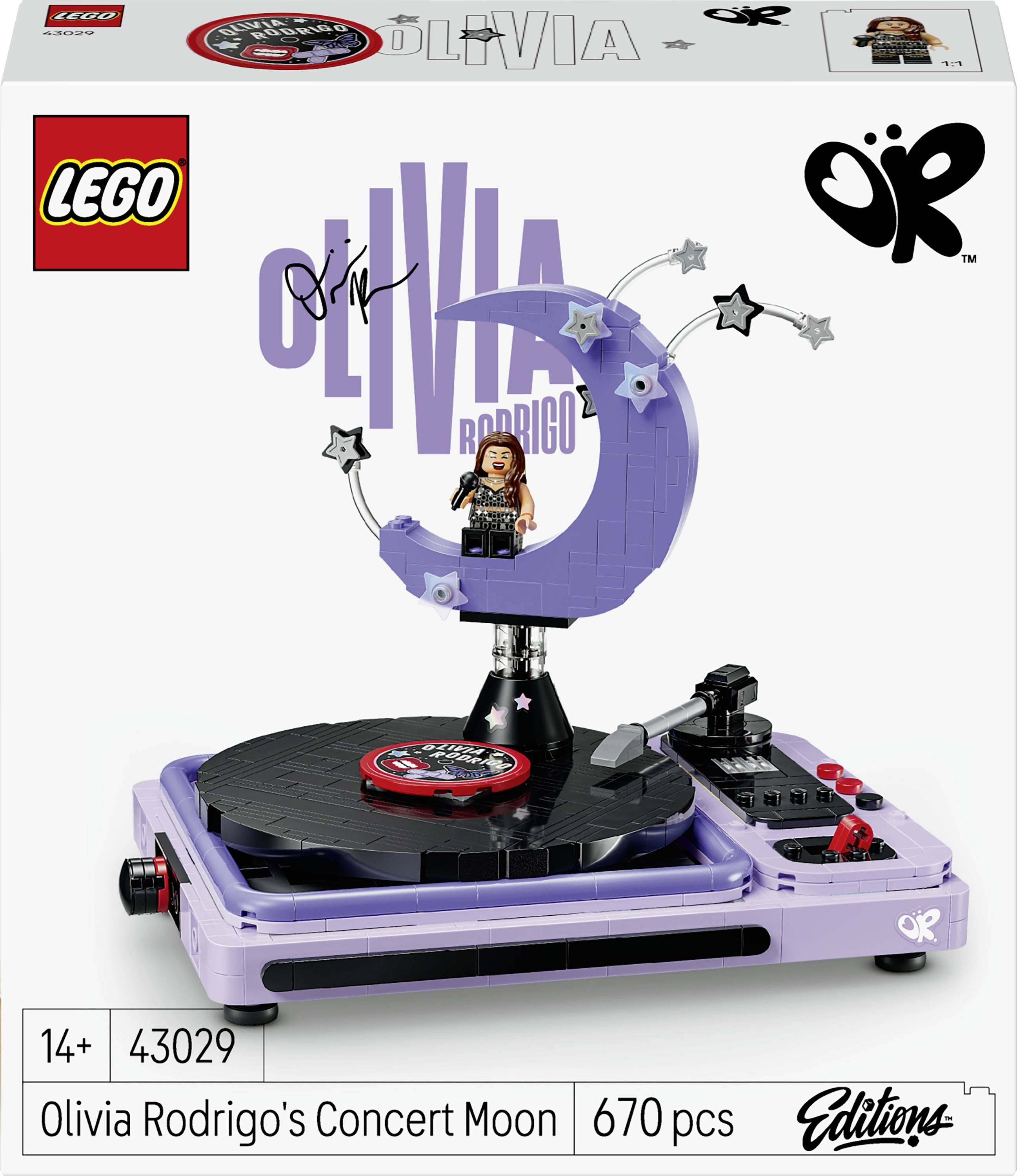 Krabice sady LEGO Ideas Olivia Rodrigo's Concert Moon s výkresy, ukazující fialové jeviště s figurkou, základnou gramofonu a 670 díly.