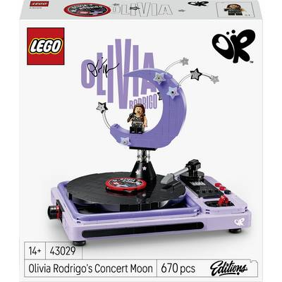 Krabice sady LEGO Ideas Olivia Rodrigo's Concert Moon s výkresy, ukazující fialové jeviště s figurkou, základnou gramofonu a 670 díly.