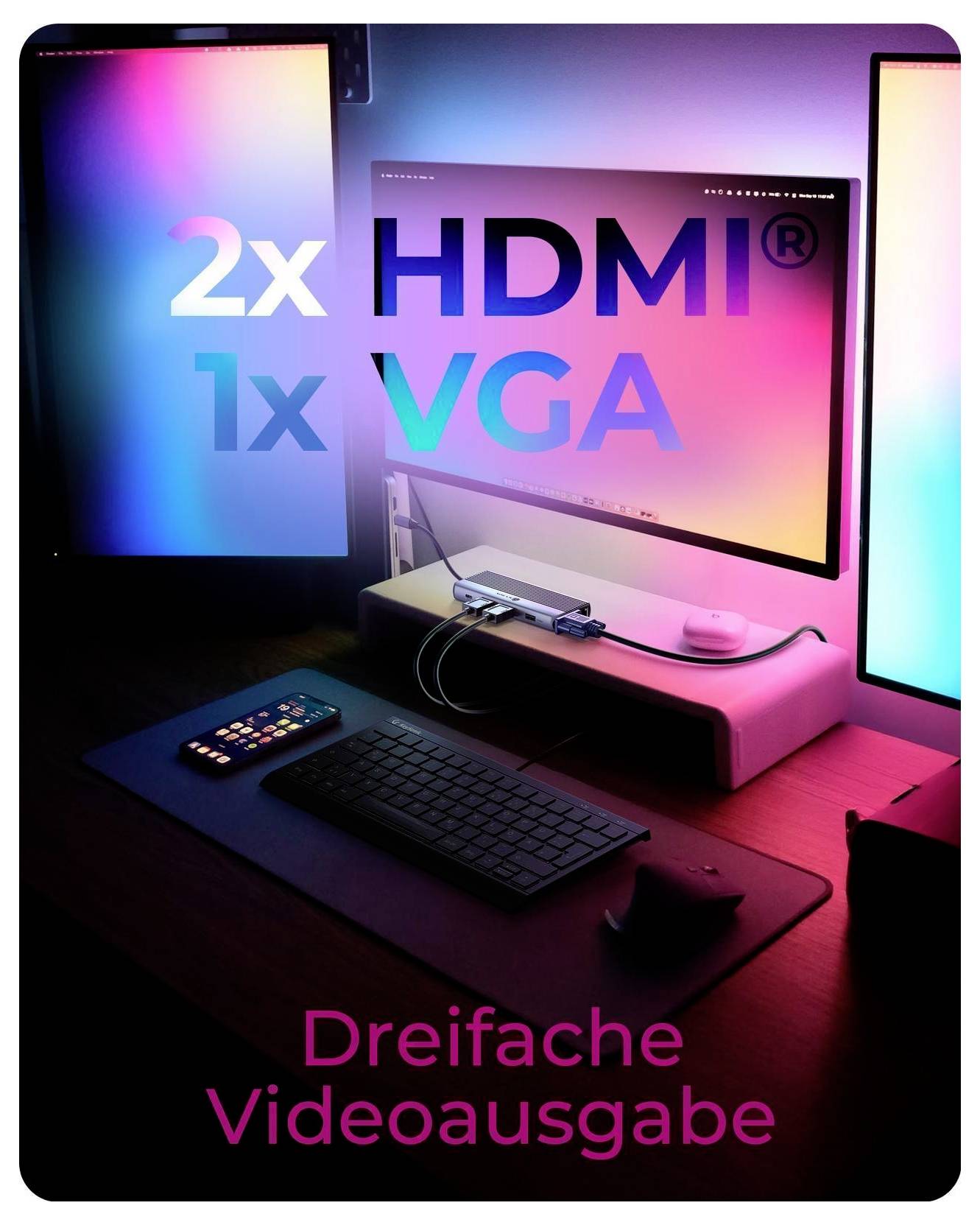 Propagační obrázek stolu se třemi monitory a textem „2x HDMI", „1x VGA" a „Trojitý videovýstup" zvýrazňující trojitý video výstup.