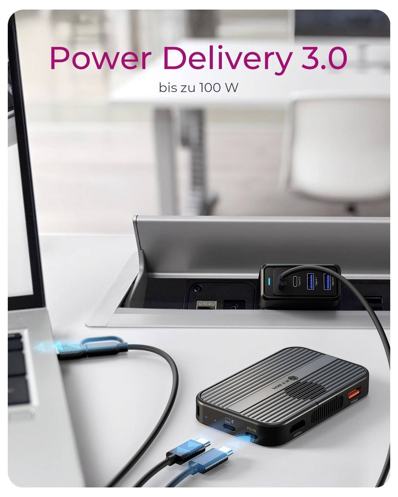 Reklama na „Power Delivery 3.0" do 100 W, ukazující dokovací stanici notebooku a USB nabíjecí rozbočovač napájející připojená zařízení.