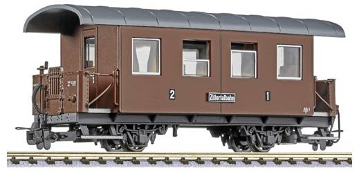Hnědý vintage model osobního železničního vozu s černou střechou a číslem 2 na boku, zobrazený na trati.