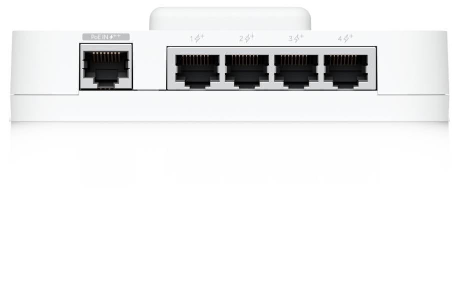 Bílé síťové zařízení s pěti porty Ethernet na zadní straně, včetně jednoho označeného PoE In a čtyř číslovaných 1-4.
