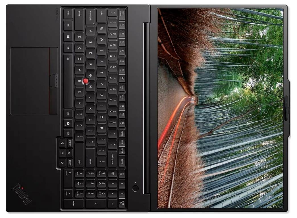 Přenosný počítač ThinkPad zobrazený v otevřeném stavu v orientaci podobné tabletu, s klávesnicí vlevo a tapetou lesní cesty na obrazovce.
