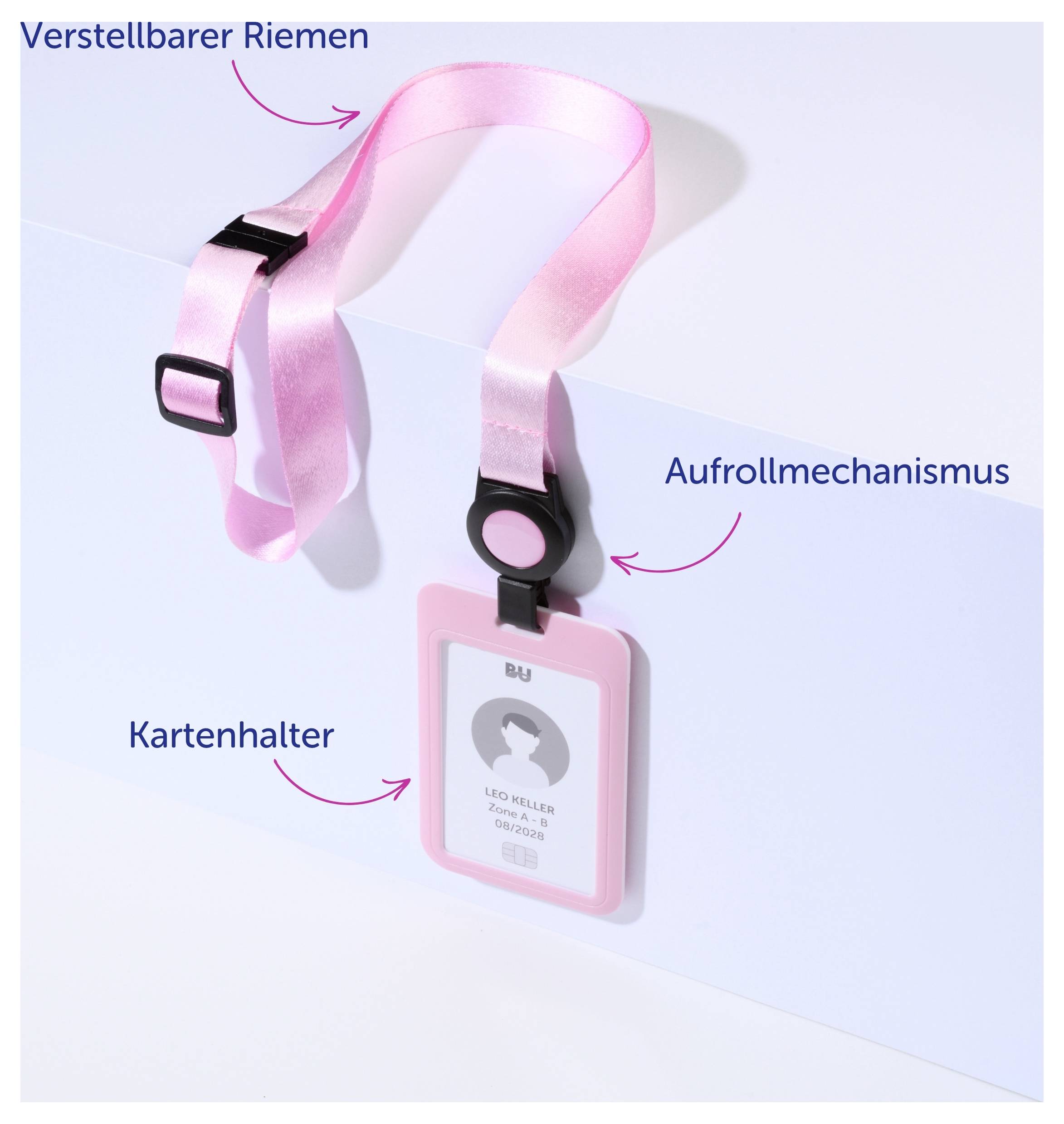 Růžový držák průkazu s nastavitelným popruhem, mechanismem na navíjení a pouzdrem na kartu nebo průkaz.