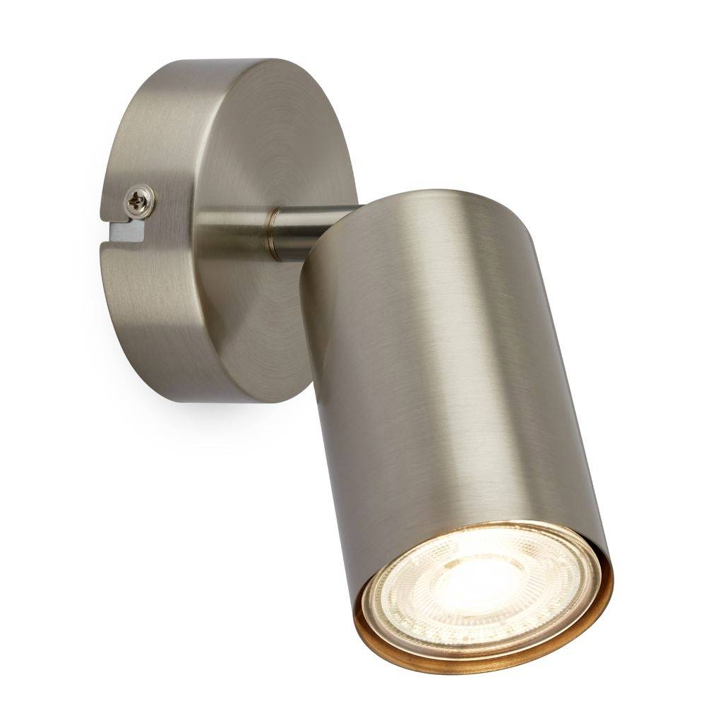 Kartáčovaný kovový nastavitelný nástěnný reflektor s válcovitou hlavicí lampy na kulaté montážní desce, zobrazený na bílém pozadí.