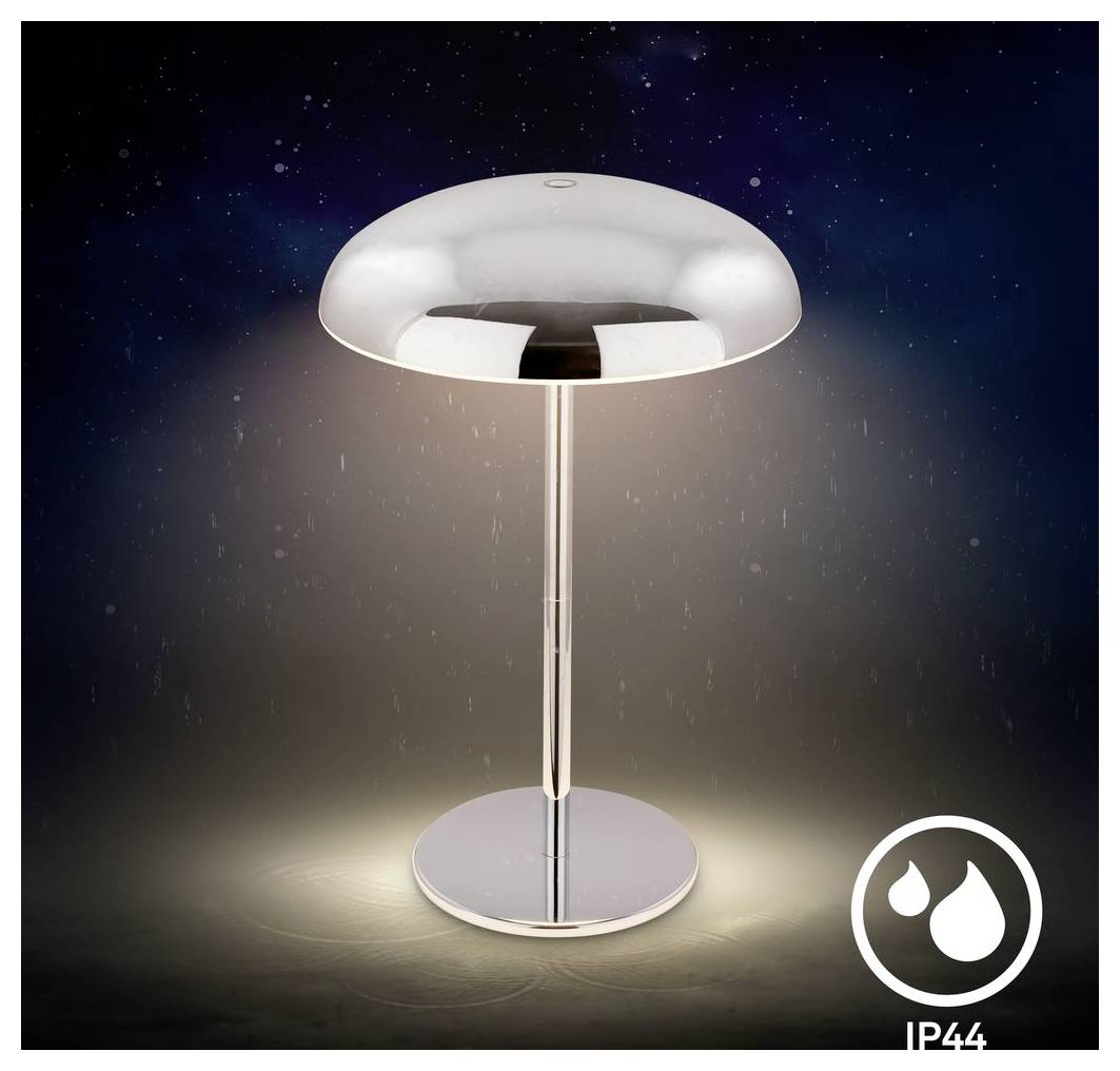 Moderní chromovaná stolní lampa s kupolovou stínidlem měkce zářící, zobrazená s ikonou odolnosti IP44 proti vodě v pravém dolním rohu.