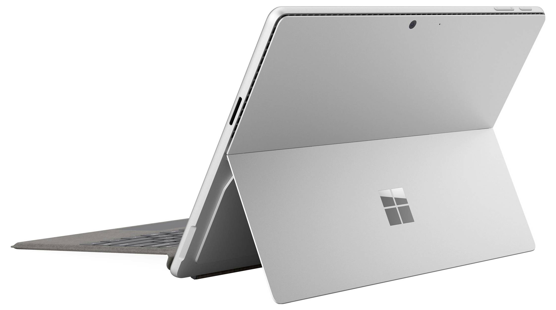 Stříbrný tablet Microsoft Surface se stojánkem a odnímatelnou klávesnicí, zobrazený otevřený v bočním pohledu na bílém pozadí.