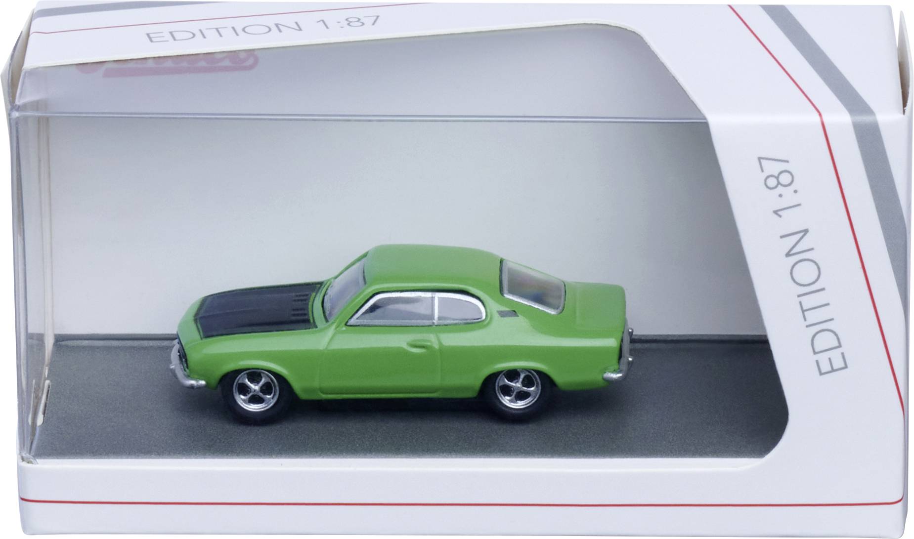 Zelené odlité hračka autíčko v krabici s nálepkou "EDITION 1:87".