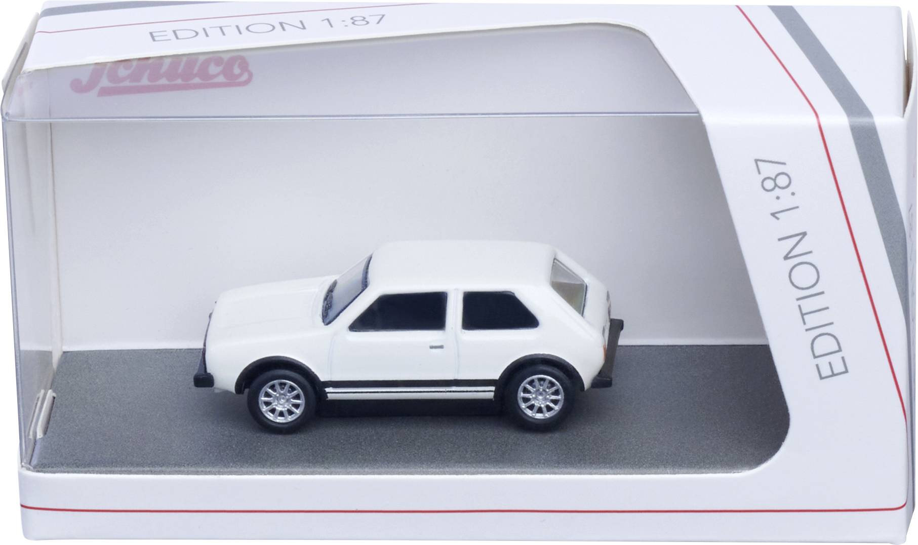 Bílé hračkářské SUV v průhledné vitrínce označené "Edice 1:87" a "Jamco", zobrazené v bočním pohledu na šedé podstavci.