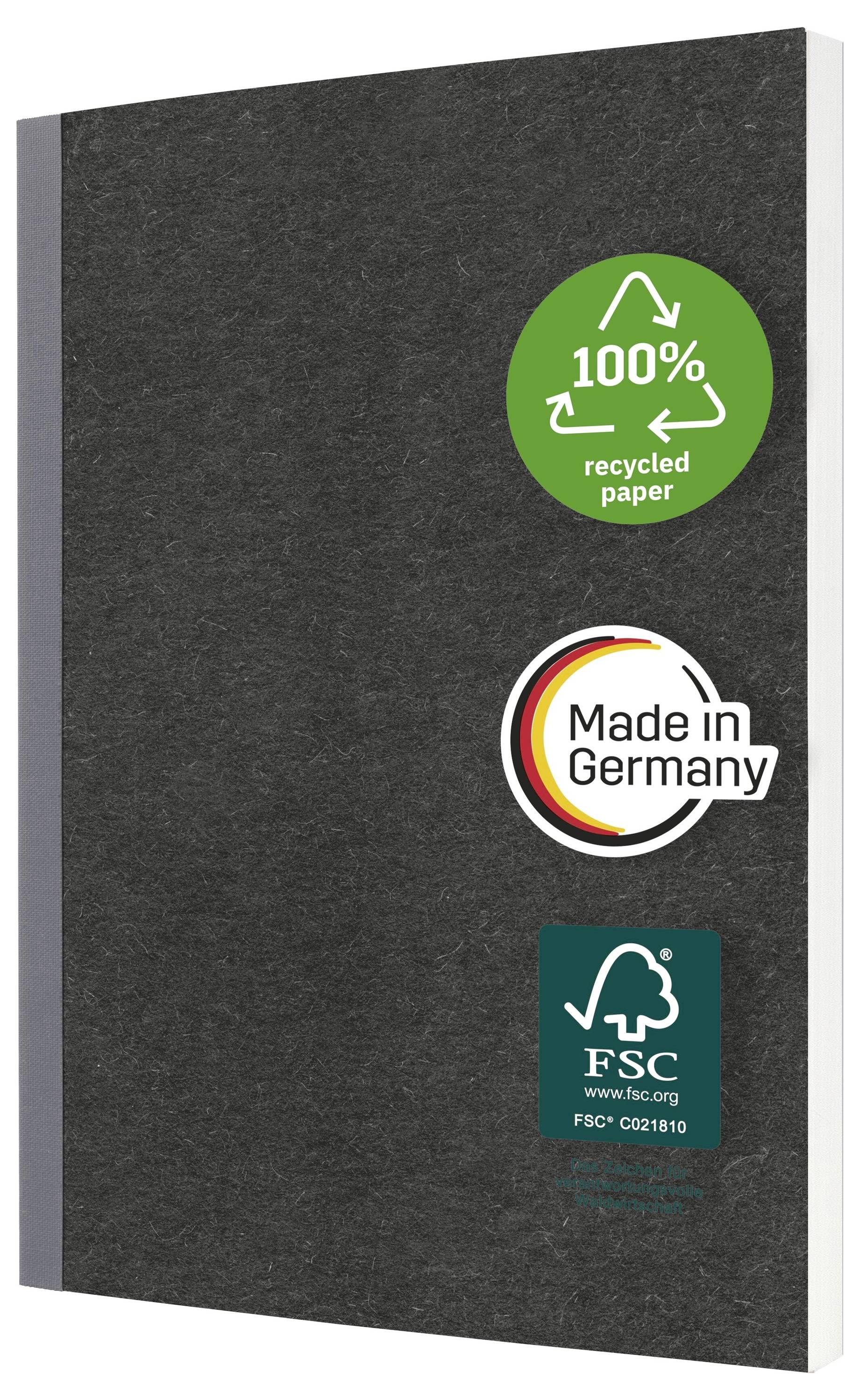 Černý pevný zápisník nebo pořadač s třemi ekologickými certifikačními nálepkami: 100% recyklovaný papír, Vyrobeno v Německu a FSC.