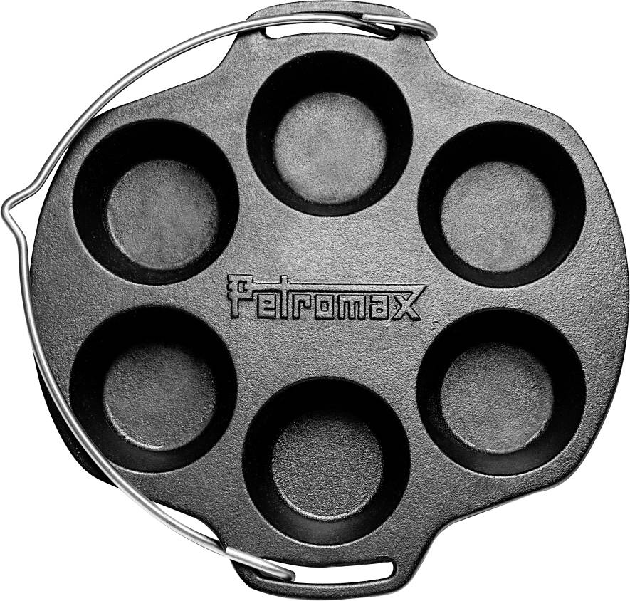 Černý šestinásobný revolver s nabíječem bubnu označený „Pelrontex", pohled shora na bílém pozadí.