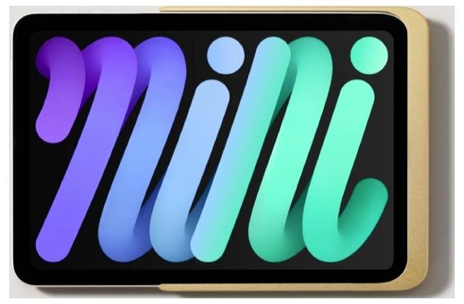 Obrazovka tabletu zobrazující barevné abstraktní logo "mi" v purpurové, modré a zelené barvě na černém pozadí.