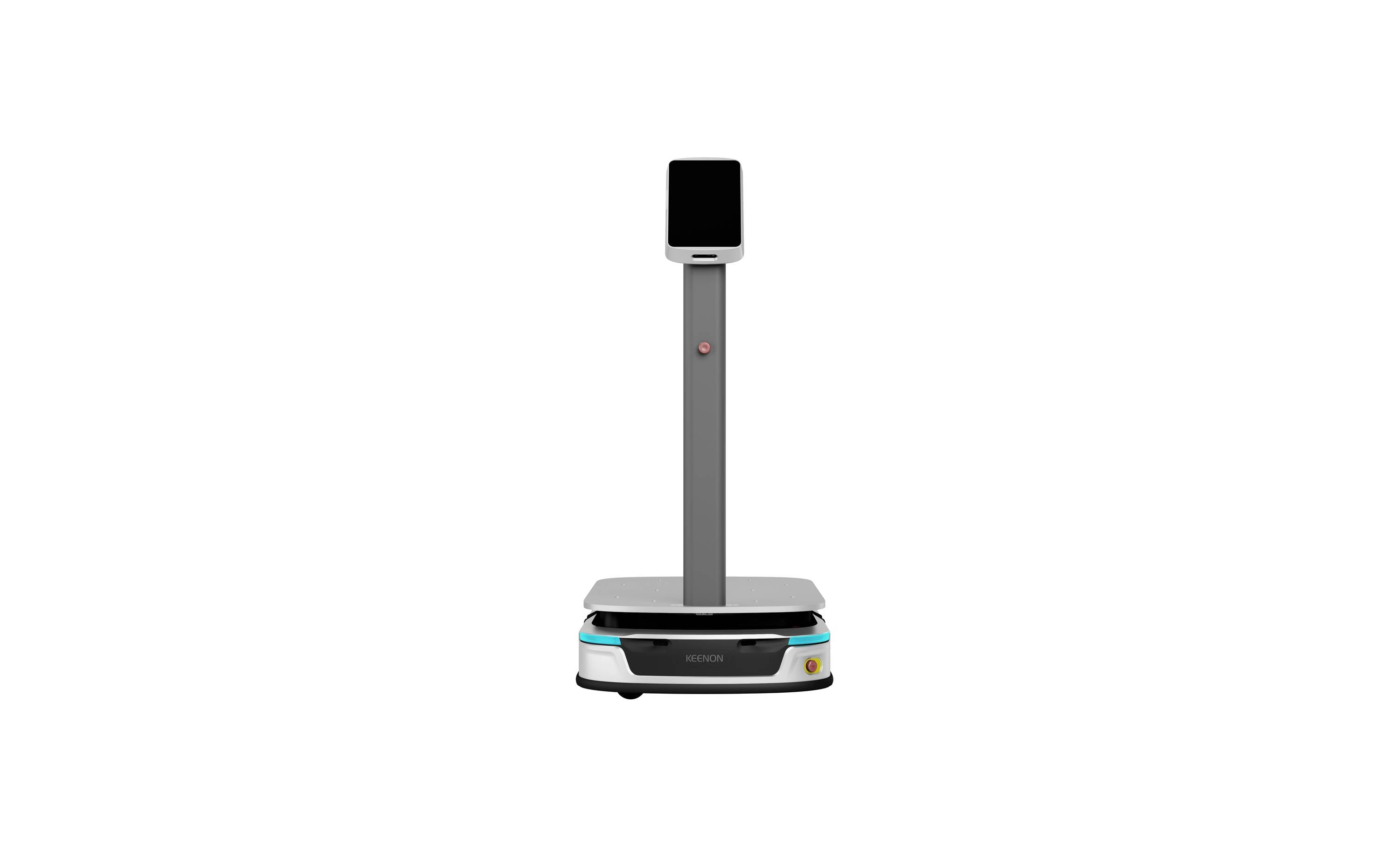 Malý autonomní doručovací robot se svislou obrazovkou/věží a nízkou podvozkem na kolečkách, zobrazený uprostřed na bílém pozadí.