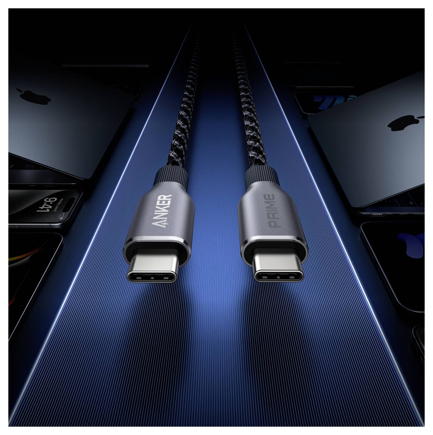 Dva pletené kabely USB-C na nabíjení označené 'ANKER' a 'PRIME' na modře osvětleném povrchu se smartphony kolem nich.