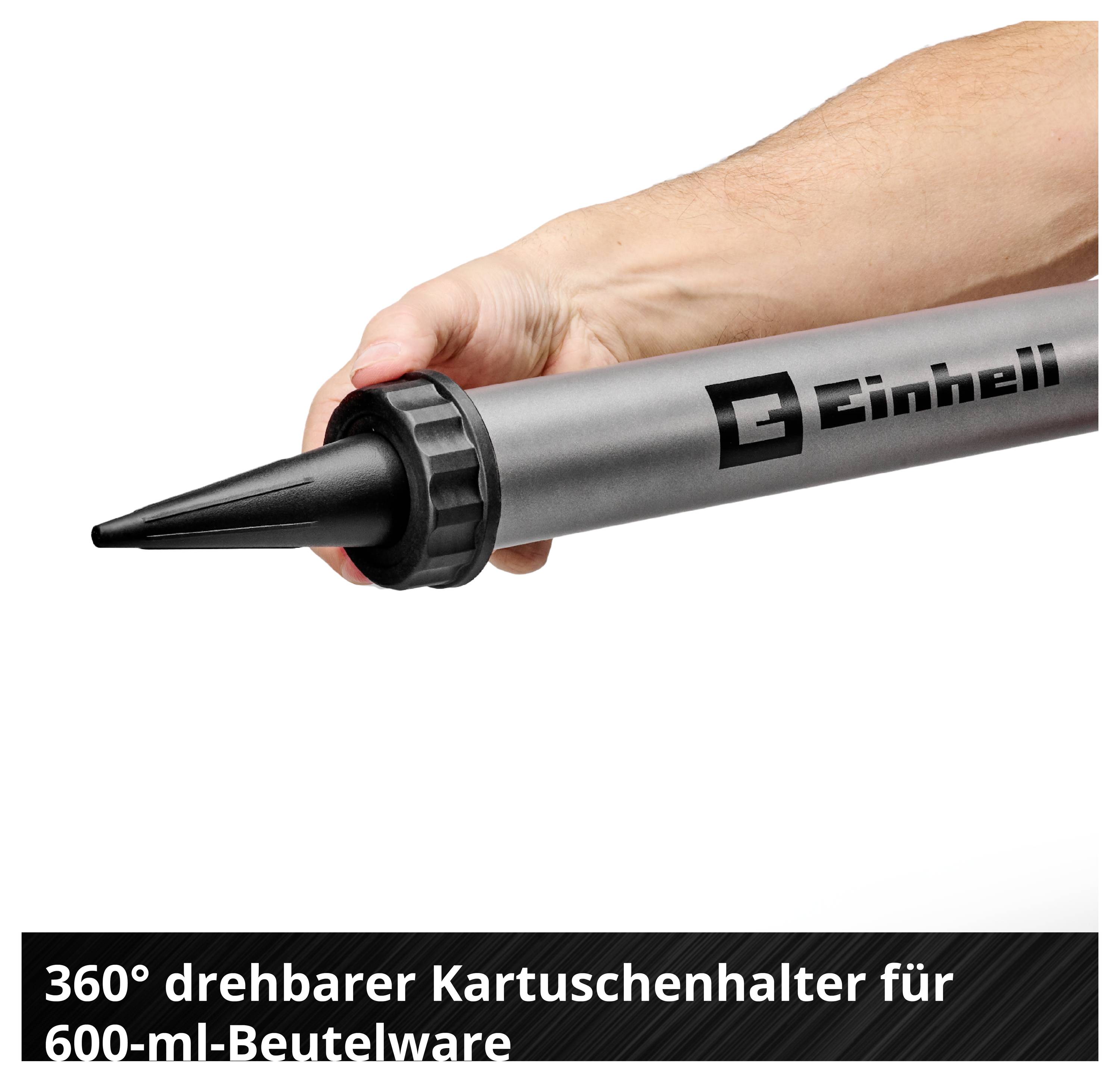 Ruka drží cartridgeový držák Einhell s černou hubicí; dole je napsáno "360° otočný cartridgeový držák pro sáčkové zboží o objemu 600 ml".