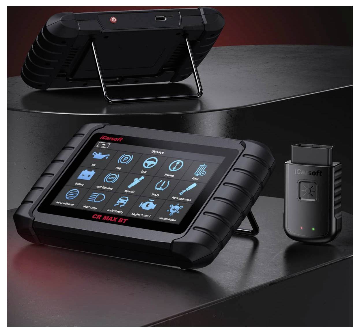 Diagnostický tablet iCarsoft CR MAX BT s kapacitní obrazovkou a ikonami, zobrazený zepředu a zezadu s odpovídajícím adaptérem Bluetooth OBD.