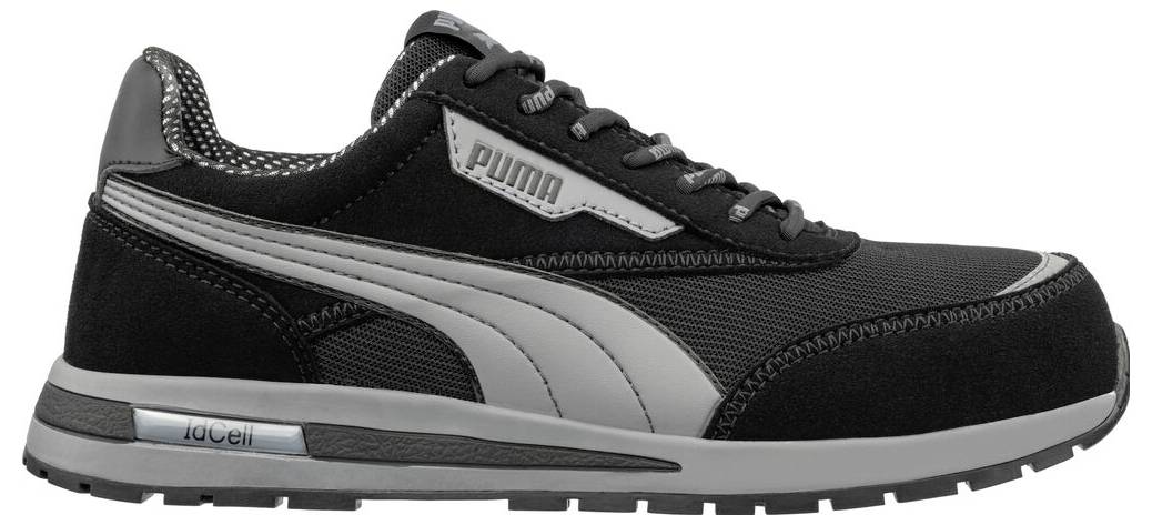 Černé tenisky Puma se šedým logem na boku a bílou podešví, zobrazené v profilu na bílém pozadí.