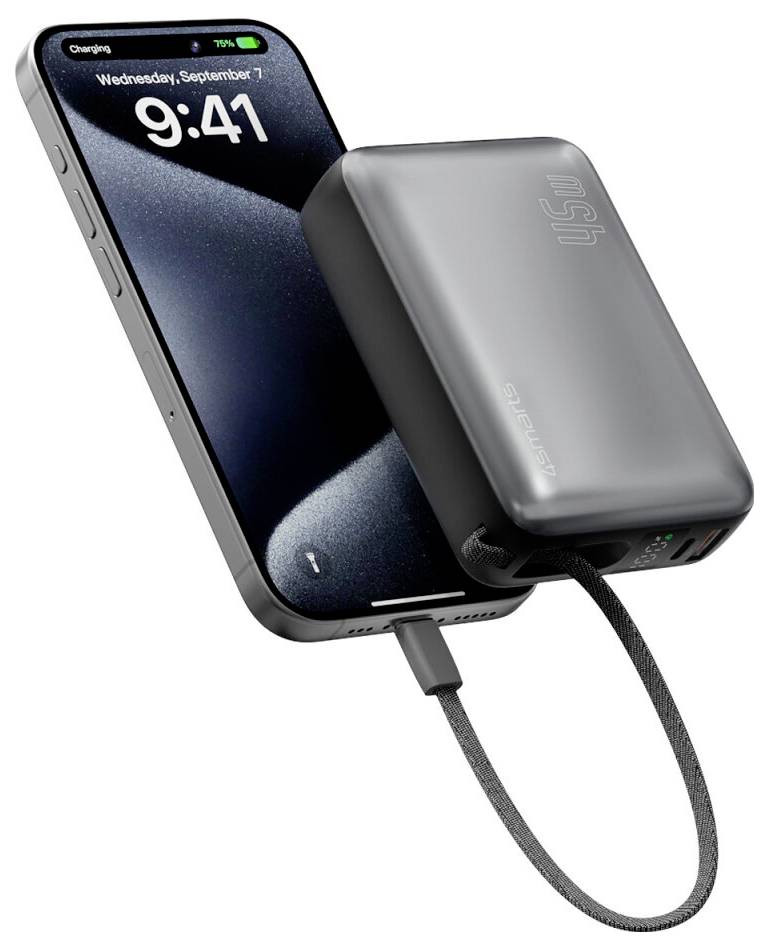 Nabíjení smartphonu s magnetickou powerbankou připojenou na zadní straně, propojenou kabelem, zobrazující obrazovku s nízkým stavem baterie.