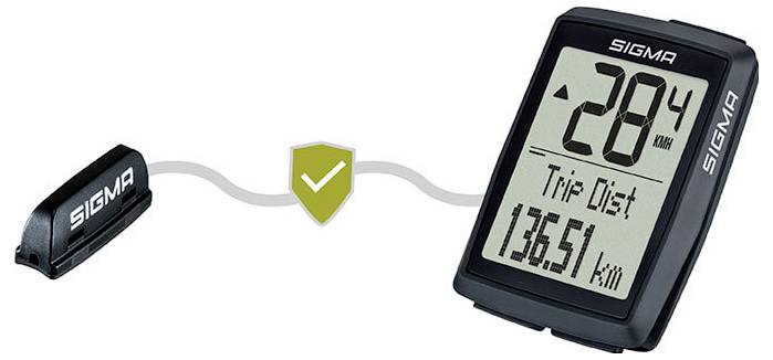 Bezdrátový cyklistický počítač Sigma s čidlem na řídítku a displejem zobrazující '29.4 km/h' a 'Trip Dist 136.51 km' uprostřed ikony značky kontroly signálu.