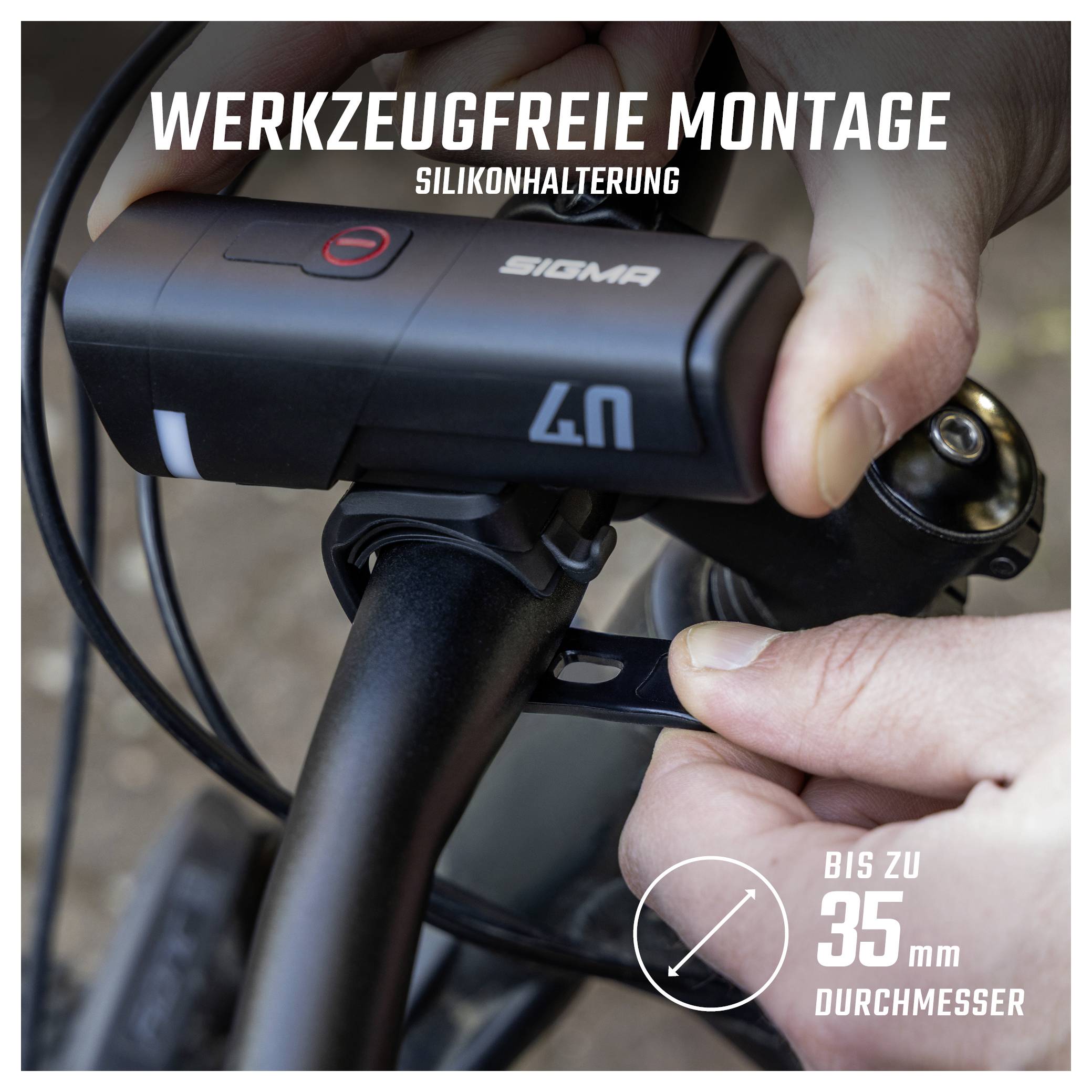 Montáž silikonu obsahující Sigma cyklistické lampě na řídítka s beztrumentálním upevněním; vhodné pro řídítka do průměru 35 mm.