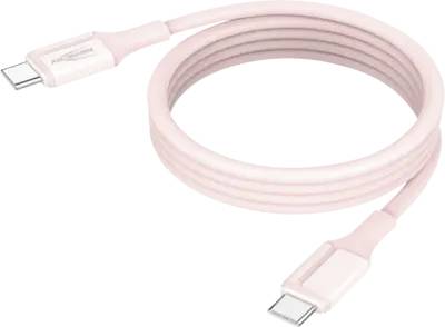 Růžový USB-C nabíjecí kabel stočený na bílém pozadí s viditelnými konektory na obou koncích.