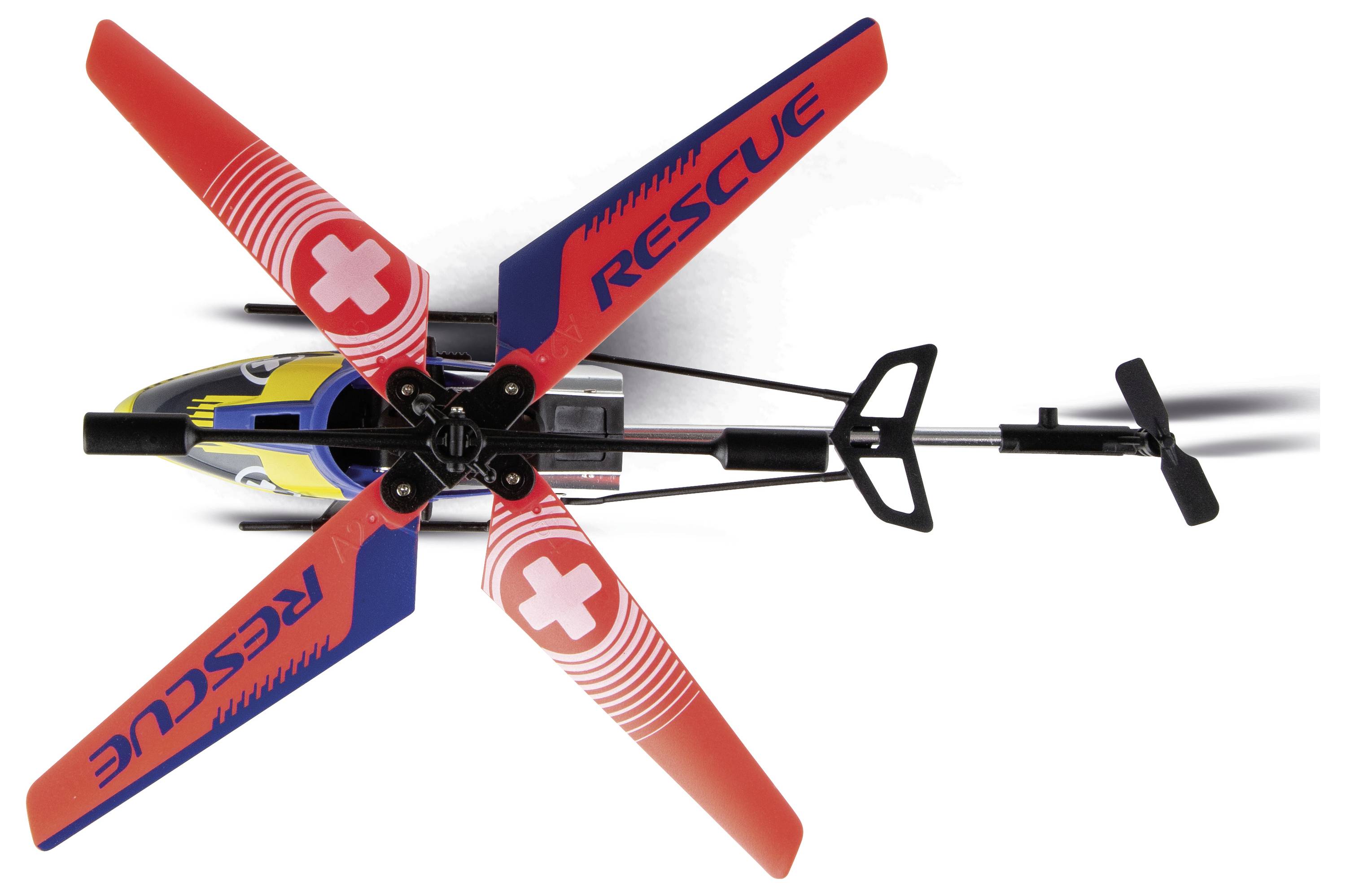 Pohled z ptačí perspektivy na červeno-modrou záchrannou helikoptéru hračku s rotujícími rotory, izolovanou na bílém pozadí.