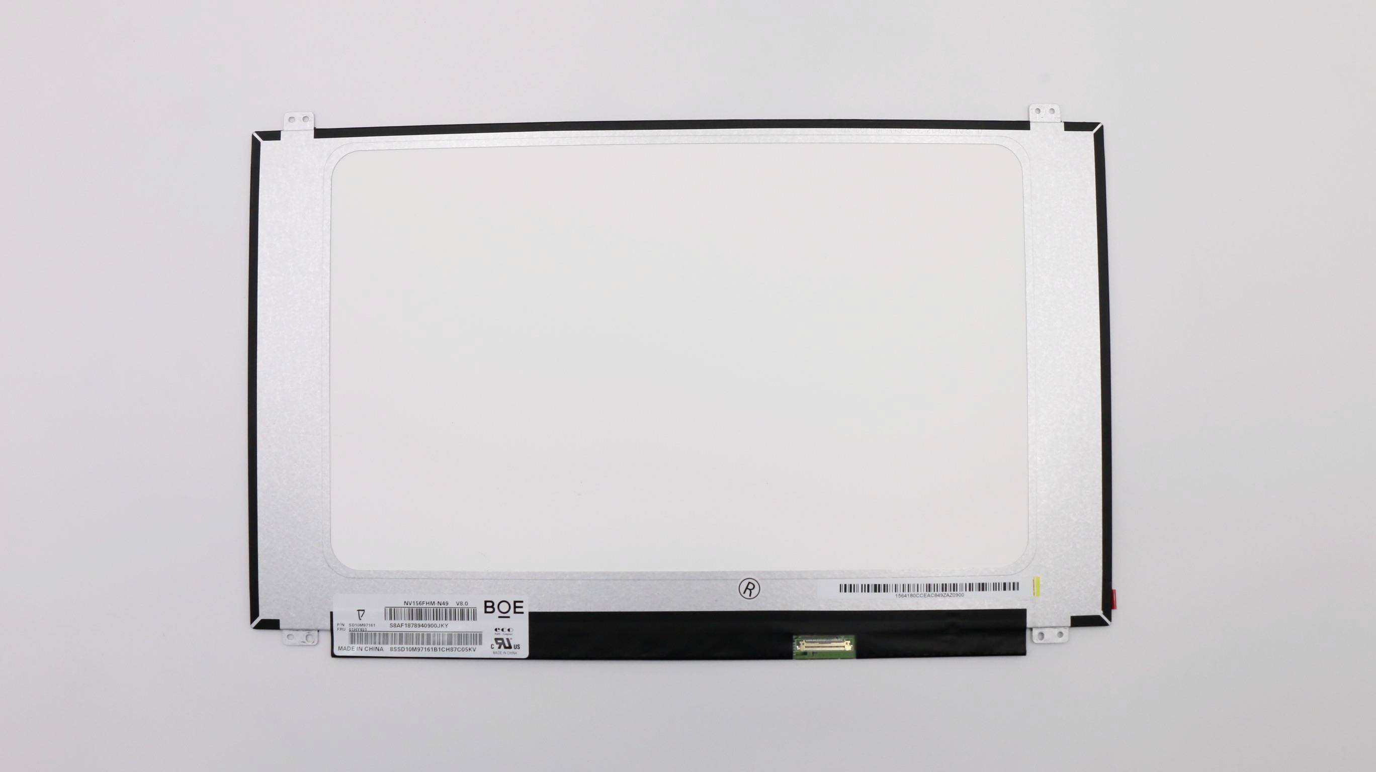 Rozbalovací LCD panel přenosného počítače na prostém bílém pozadí, zobrazující zadní stranu s upevňovacími konzolami a konektorovým páskem.