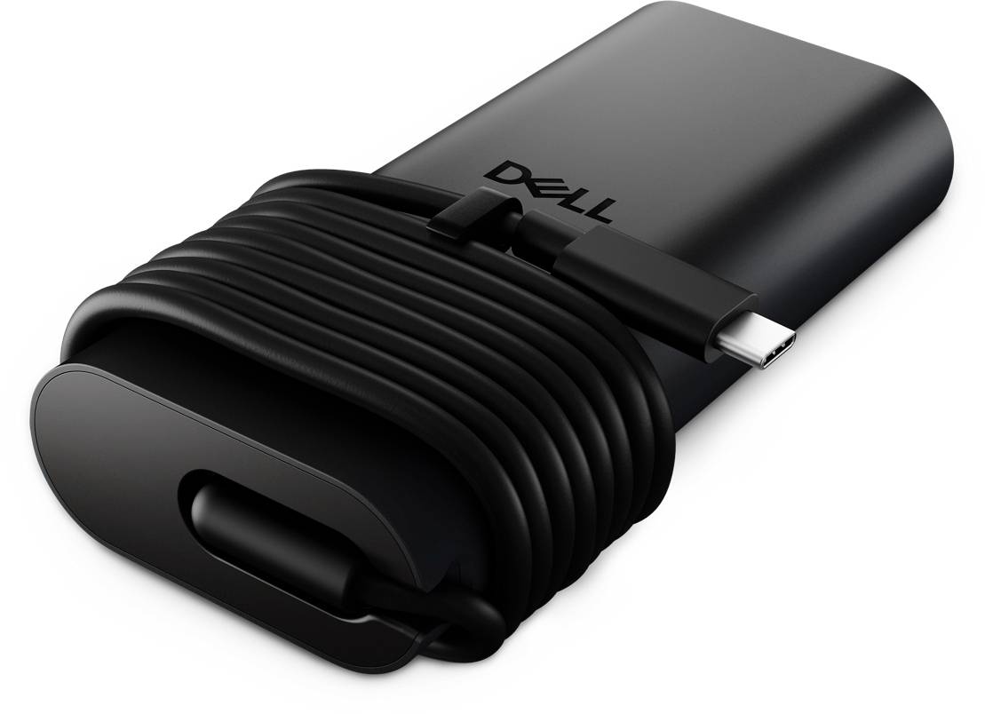 Černá nabíječka značky Dell s USB-C konektorem se spirálovitým kabelem ovinutým kolem ní na bílém pozadí.