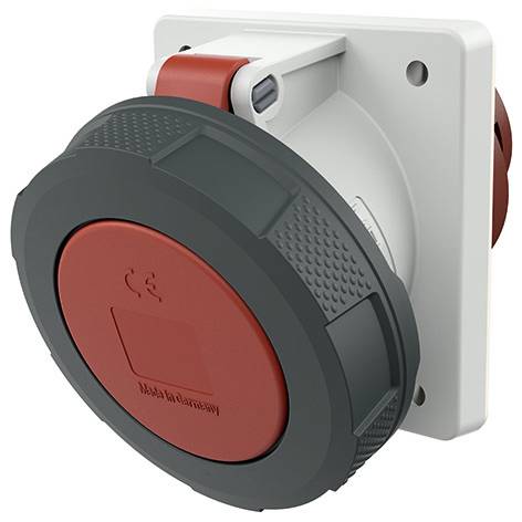 Průmyslový kulatý elektrický konektor s červenou zámkovou čepičkou namontovanou na bílé čtvercové desce.