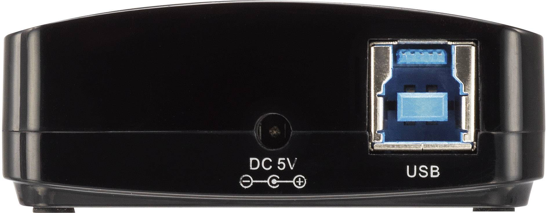 Zadní strana elektronického zařízení s napájecím DC 5V vstupem vlevo a USB portem vpravo, na černém krytu.