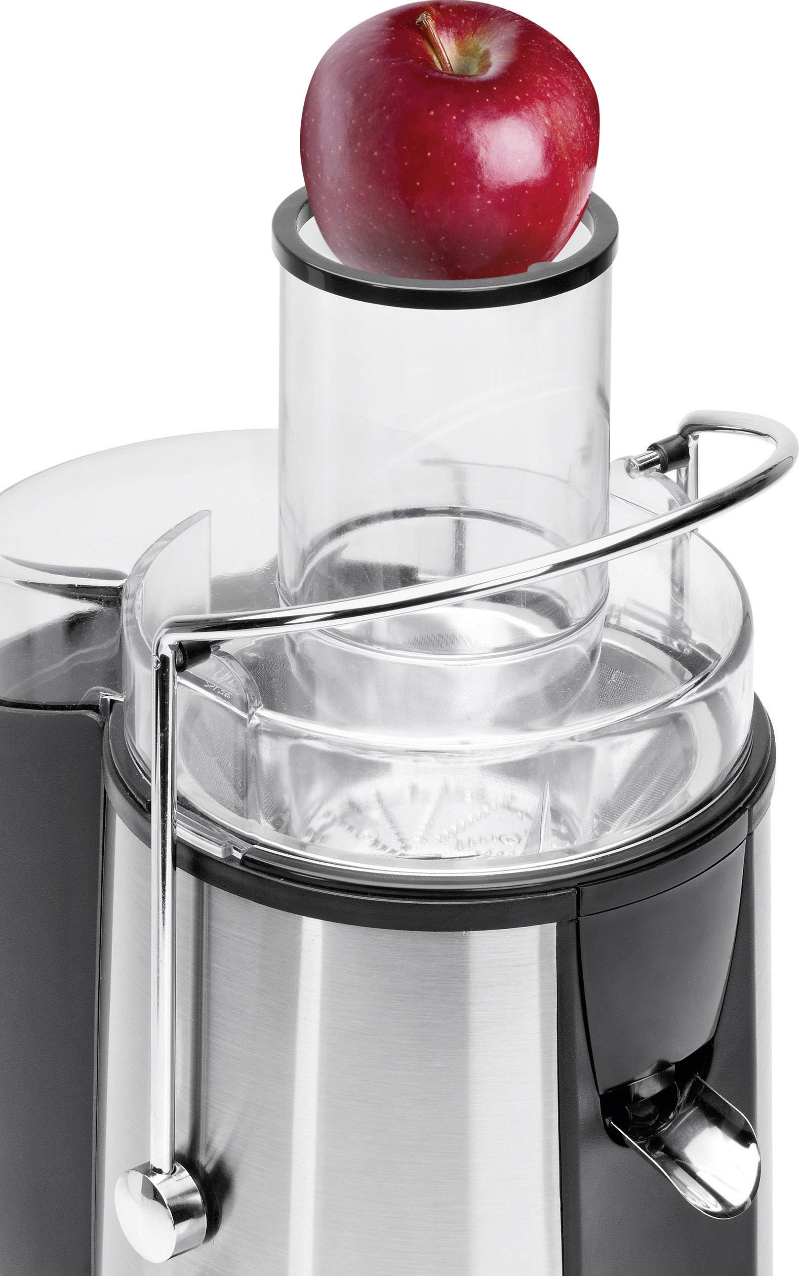 Stříbrný odšťavňovač s červeným jablkem v plnicím otvoru, připravený k lisování.