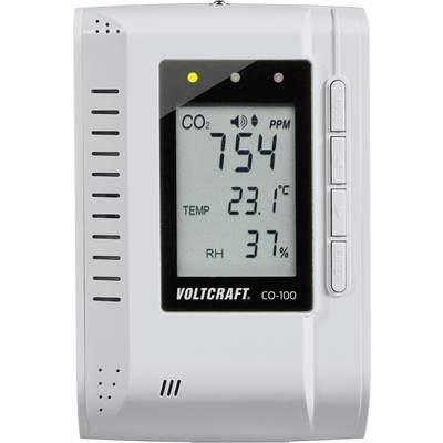 Měřicí přístroj pro kvalitu vzduchu s displejem: Hodnota CO2 754 PPM, teplota 23,1°C, vlhkost vzduchu 37%. Značka: Voltcraft CO-100.