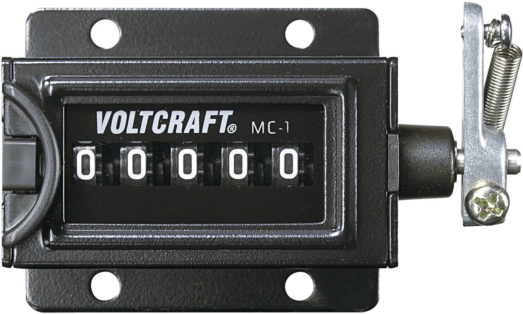 Mechanický počítadlo od Voltcraftu s pěti válečkovými číslicemi nastaveými na '00000'. Přístroj je černý se stříbrnými detaily.