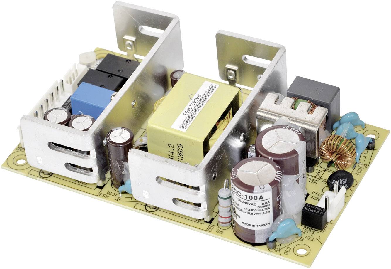 Elektronická deska s různými komponenty, včetně kondenzátorů, transformátoru a chladiče, namontovaná na světle hnědé desce plošných spojů.
