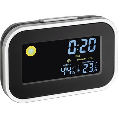 Černý digitální termo-hygrometr ukazuje čas 0:20, vlhkost vzduchu 44 % a teplotu 23,6°C. Vlevo nahoře žlutý symbol světla.