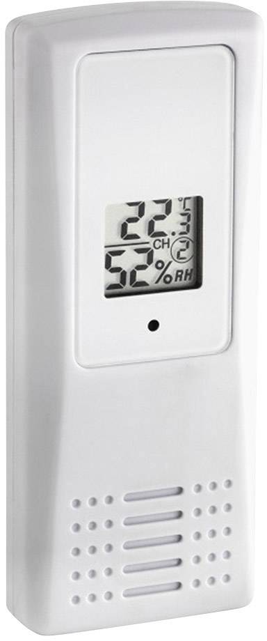 Digitální termo-hygrometr v bílém pouzdře ukazuje 22°C a 52% relativní vlhkosti.