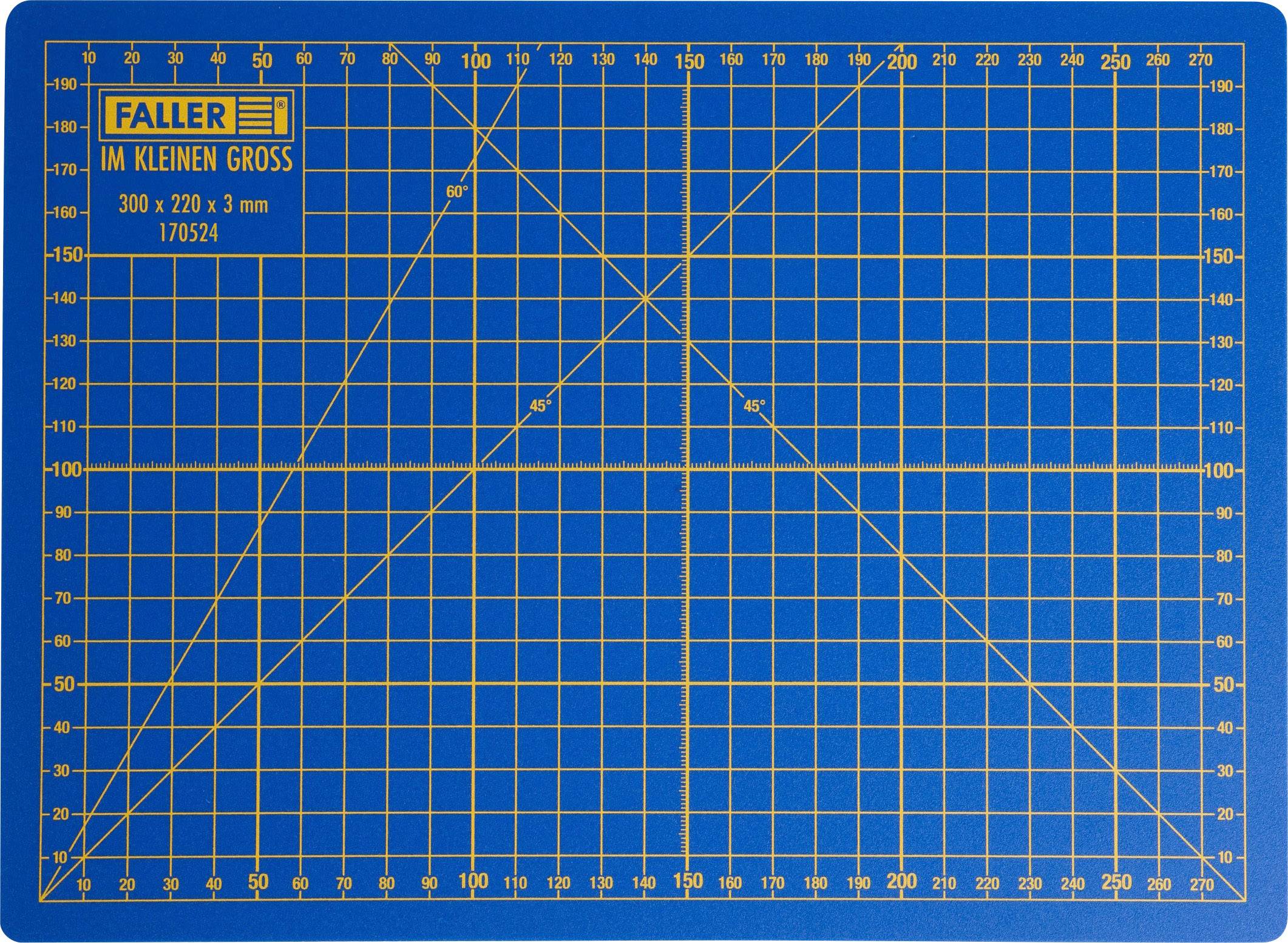 Modrá řezací podložka se žlutým mřížkovým rastrem a pravítkem. Rozměry 300x220 mm. Vlevo nahoře je napsáno 'Faller - Im Kleinen Groß'.