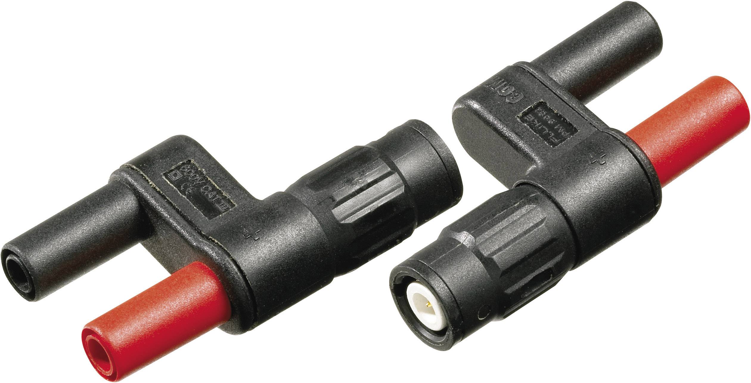Dva černé a červené elektronické konektorové adaptéry ležící vedle sebe. Jsou určeny pro propojení v elektronických obvodech.