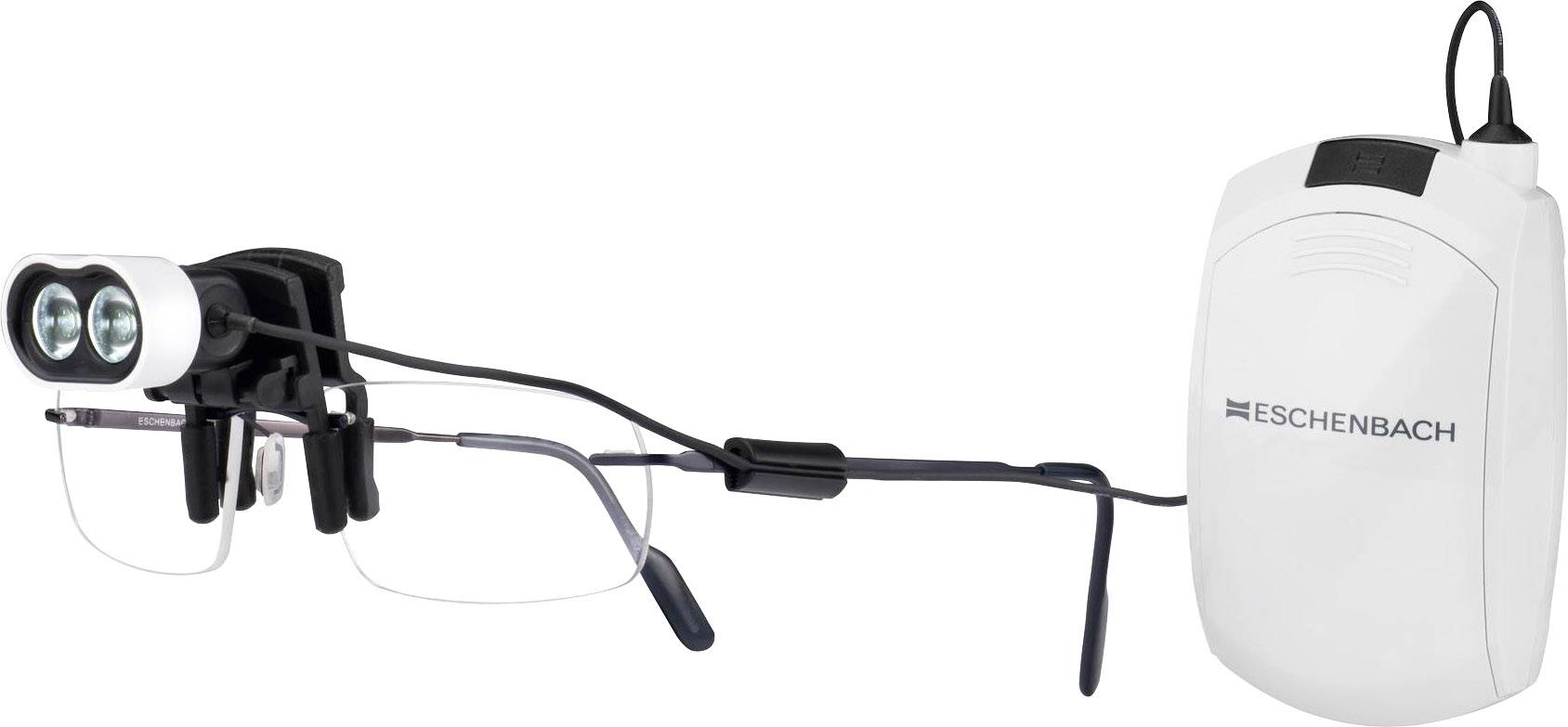 Brýle s připevněným zdvojeným světlem pro podporu vidění, propojené s bílým přenosným zařízením značky Eschenbach.