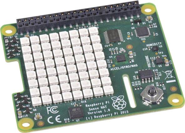 Deska Raspberry Pi Sense HAT s různými elektronickými senzory a komponenty na malé zelené desce plošných spojů.