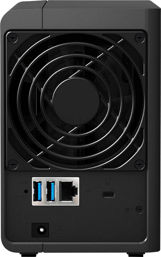 Obrázek ukazuje zadní stranu elektronického zařízení s velkým ventilátorem a několika konektory, včetně USB a LAN.