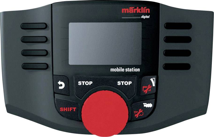 Řídící jednotka modelové železnice, označená 'Märklin digital mobile station'. Velké červené tlačítko, tlačítka pro Stop, Vpřed a Vzad.