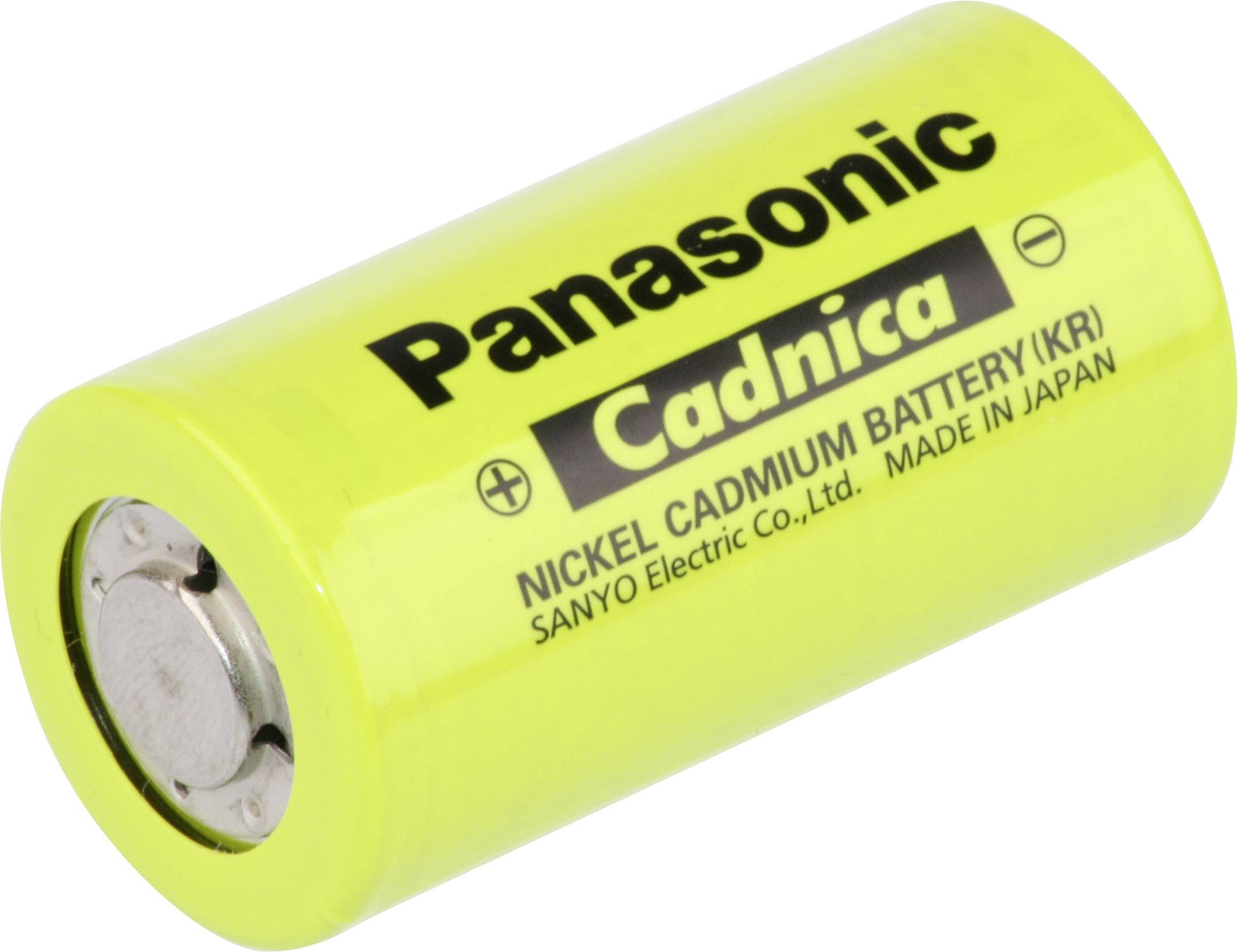 Žlutá, válcovitá nikl-kadmiová baterie z blízkého okolí, s nápisem 'Panasonic Cadnica', vyrobená v Japonsku.