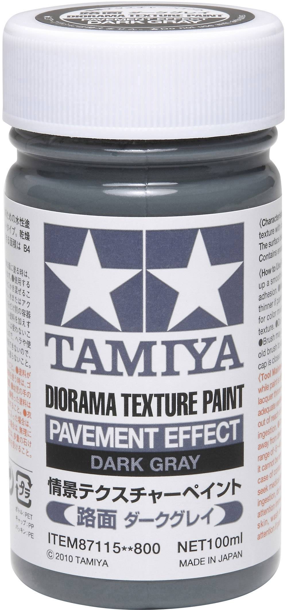 Lahev Tamiya Diorama Texture Paint, odstín 'Dark Gray', s texturami pro miniatury. Nápis na etiketě: 'Efekt dlažby'.