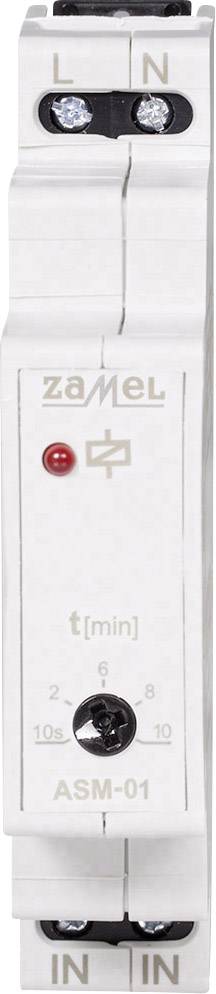 Bílé, úzké elektrické zařízení se čtyřmi připojovacími body v rozích, označené štítky 'L', 'N', 'IN', 'IN'. Nápis 'Zamel', svítí červená kontrolka.