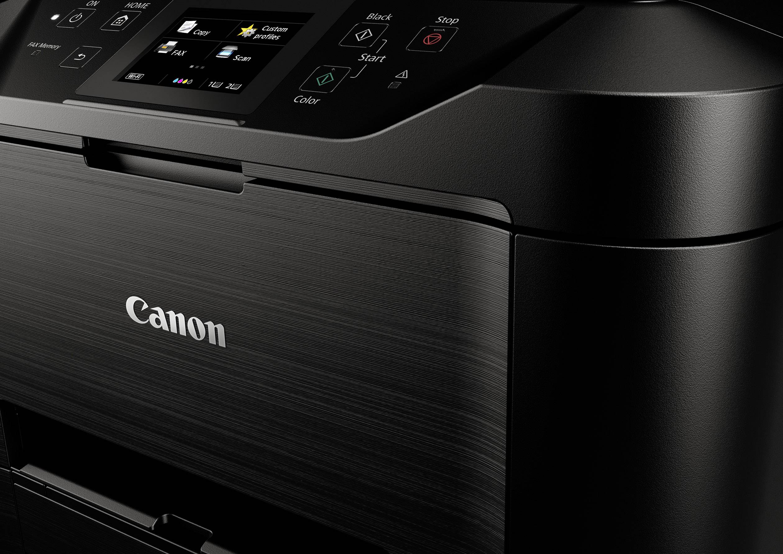 Černá multifunkční tiskárna Canon s ovládacím panelem a displejem, připravená k tisku, skenování nebo kopírování dokumentů.