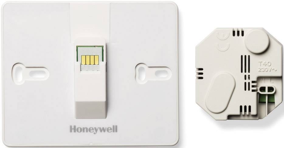 Elektrický připojovací modul s konektorem a krytem, s viditelným názvem značky 'Honeywell', vhodný pro systémy T40 230V.