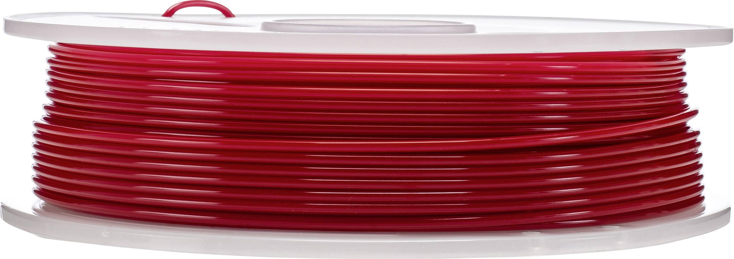 Červeně navinutý plastový drát, pravděpodobně materiál pro 3D tisk, na plastové cívce, pohled z boku.