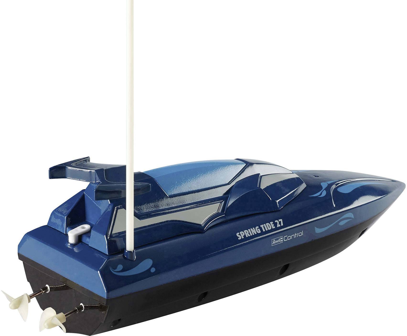 Modré modelové plavidlo s nápisem 'Spring Tide 27' na boku. Má anténu a dva malé lodní šrouby na zádi.